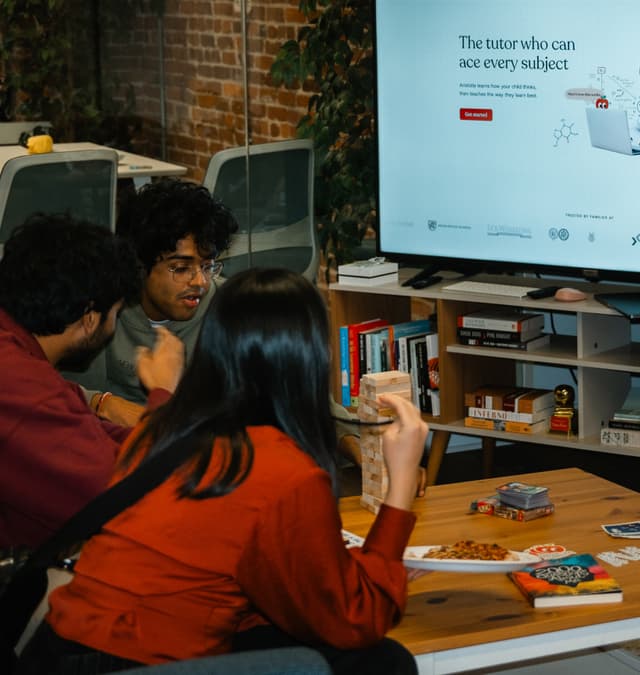 Fellows working together at a table